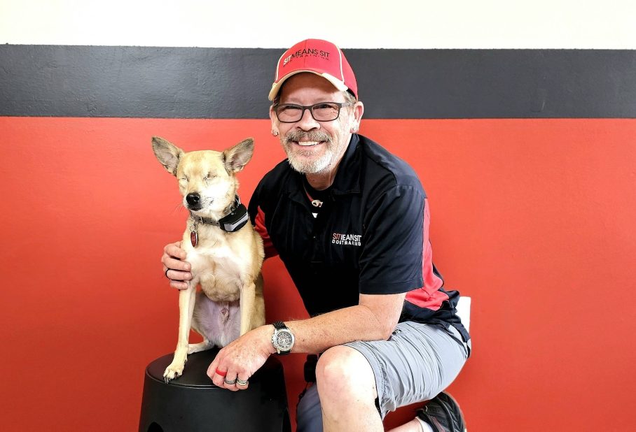 Man posing with his dog